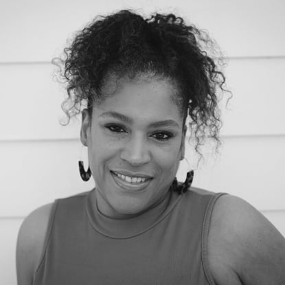 Smiling woman with curly hair